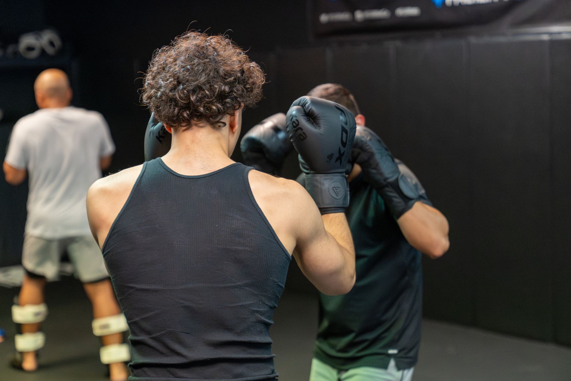 Adults drilling no-gi grappling in Adult Brazilian Jiu-Jitsu class at 10th Planet Orlando Jiu Jitsu.
