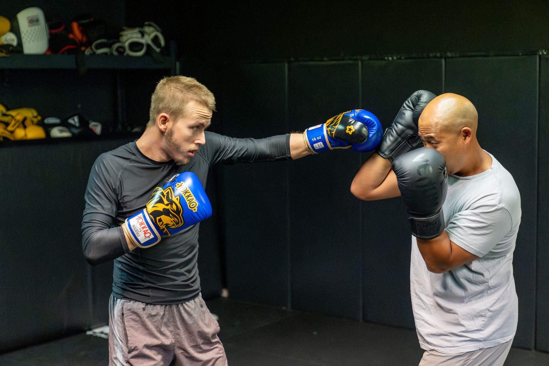 Adults practice controlled grappling at 10th Planet Orlando Jiu Jitsu in Altamonte Springs, FL.