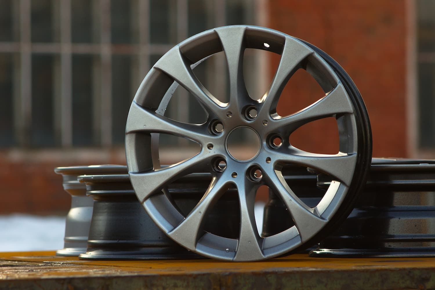 A Close up Of a Car Wheel on A Table — Chinderah Smash Repairs in Chinderah, NSW