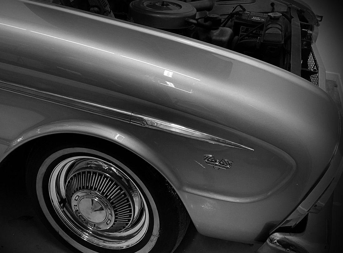 A Black And White Photo Of A Silver Car With The Hood Open — Chinderah Smash Repairs in Chinderah, NSW