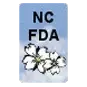 a picture of a nc fda logo with a flower on it .