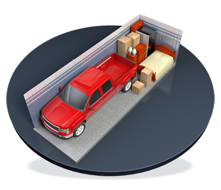 A red truck is parked inside of a storage unit.