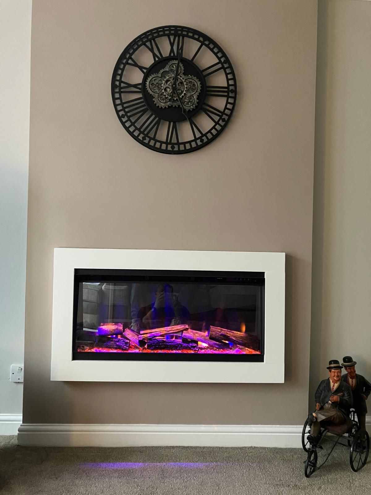 infinix electric fire in a media wall