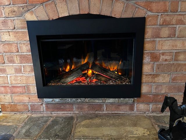 ashlett electric fire in a previos brick chimney