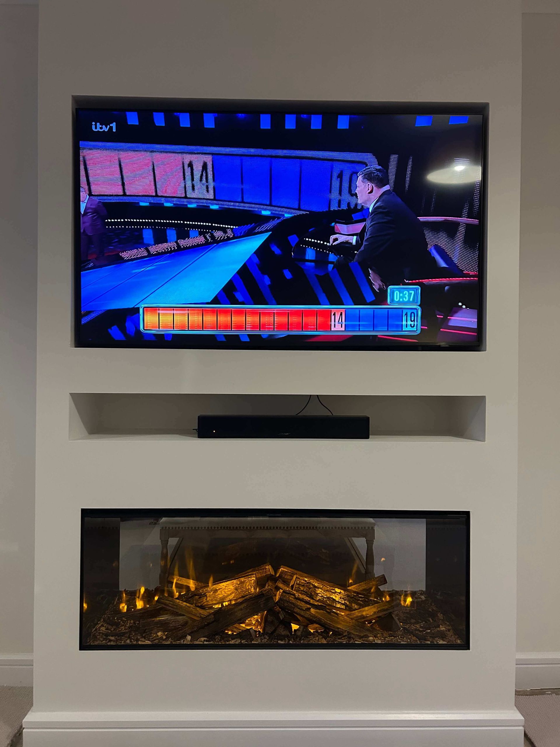 new forest 1200 electric fire in a simple media wall