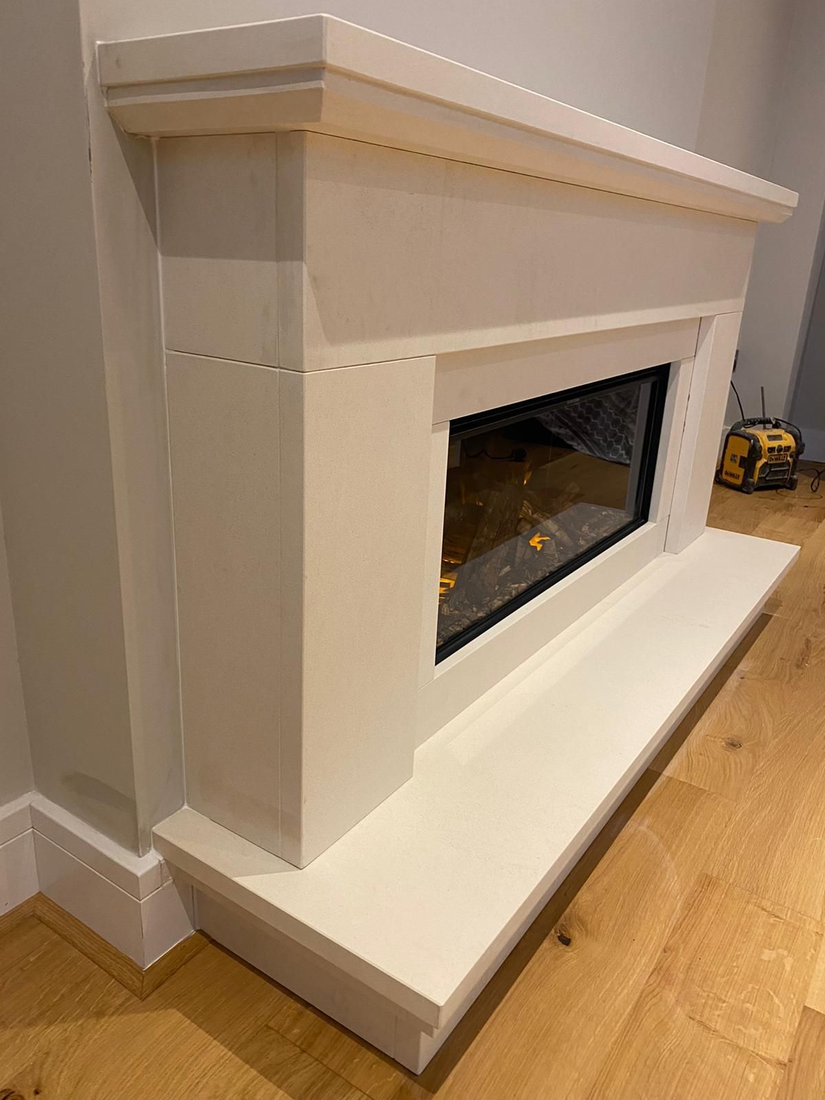 formby fireplace in limestone, with a new forest 870 electric fire