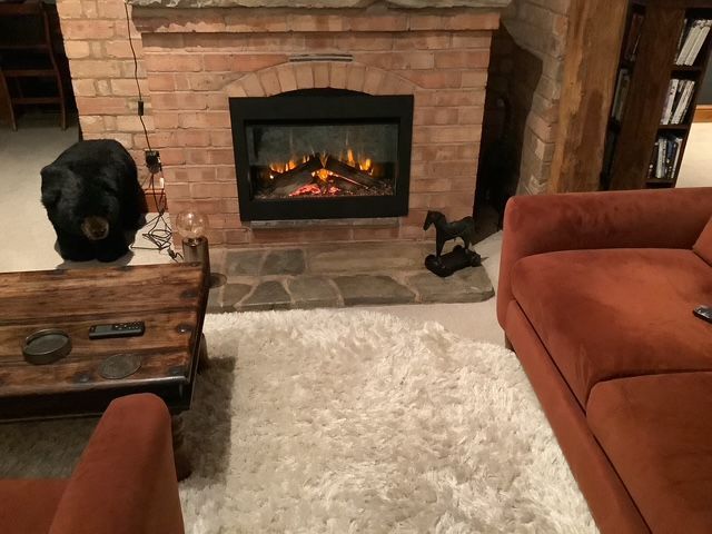 modern electric fire in an existing brick chimney