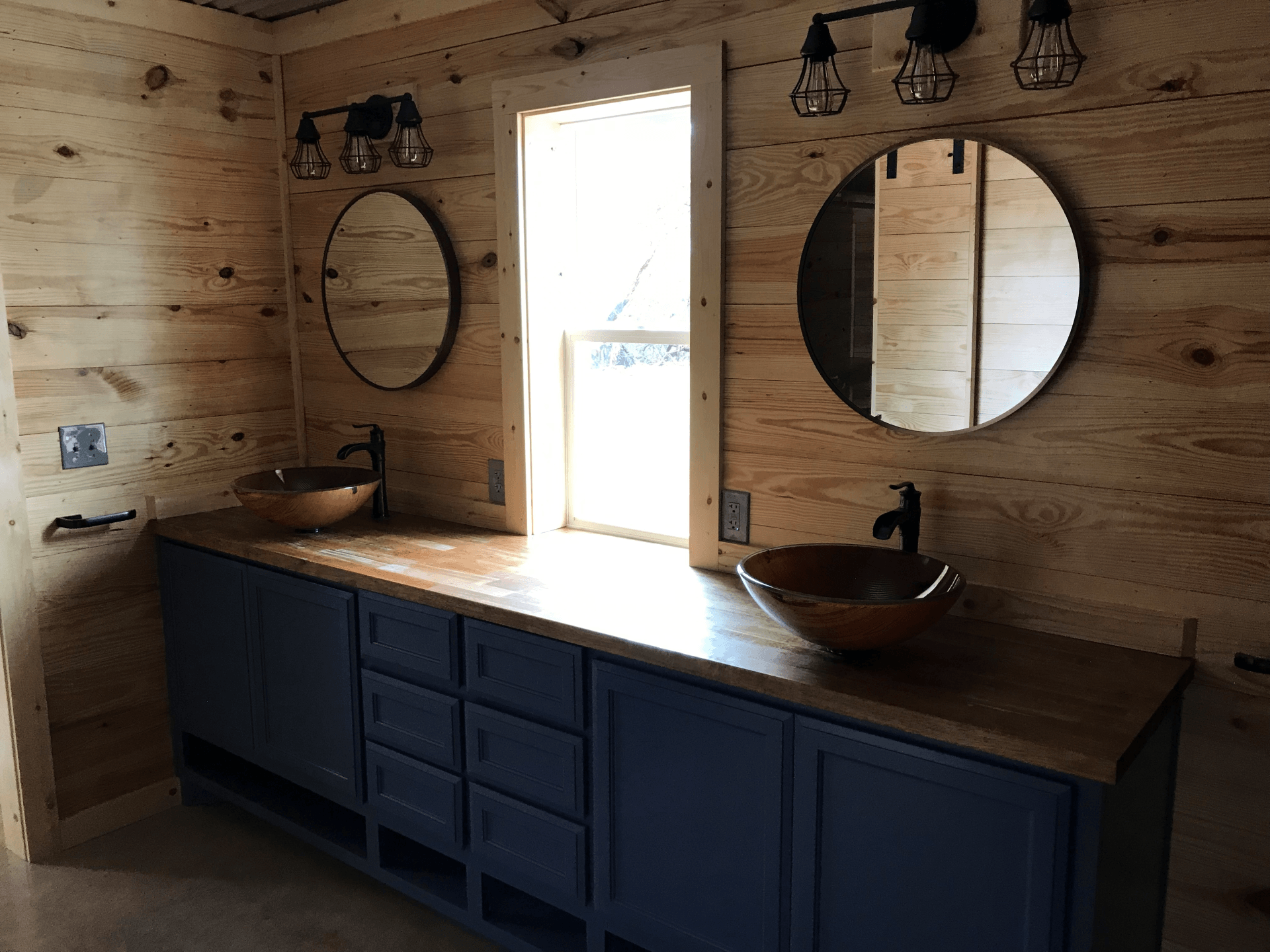 the bathroom inside of a metal home construction