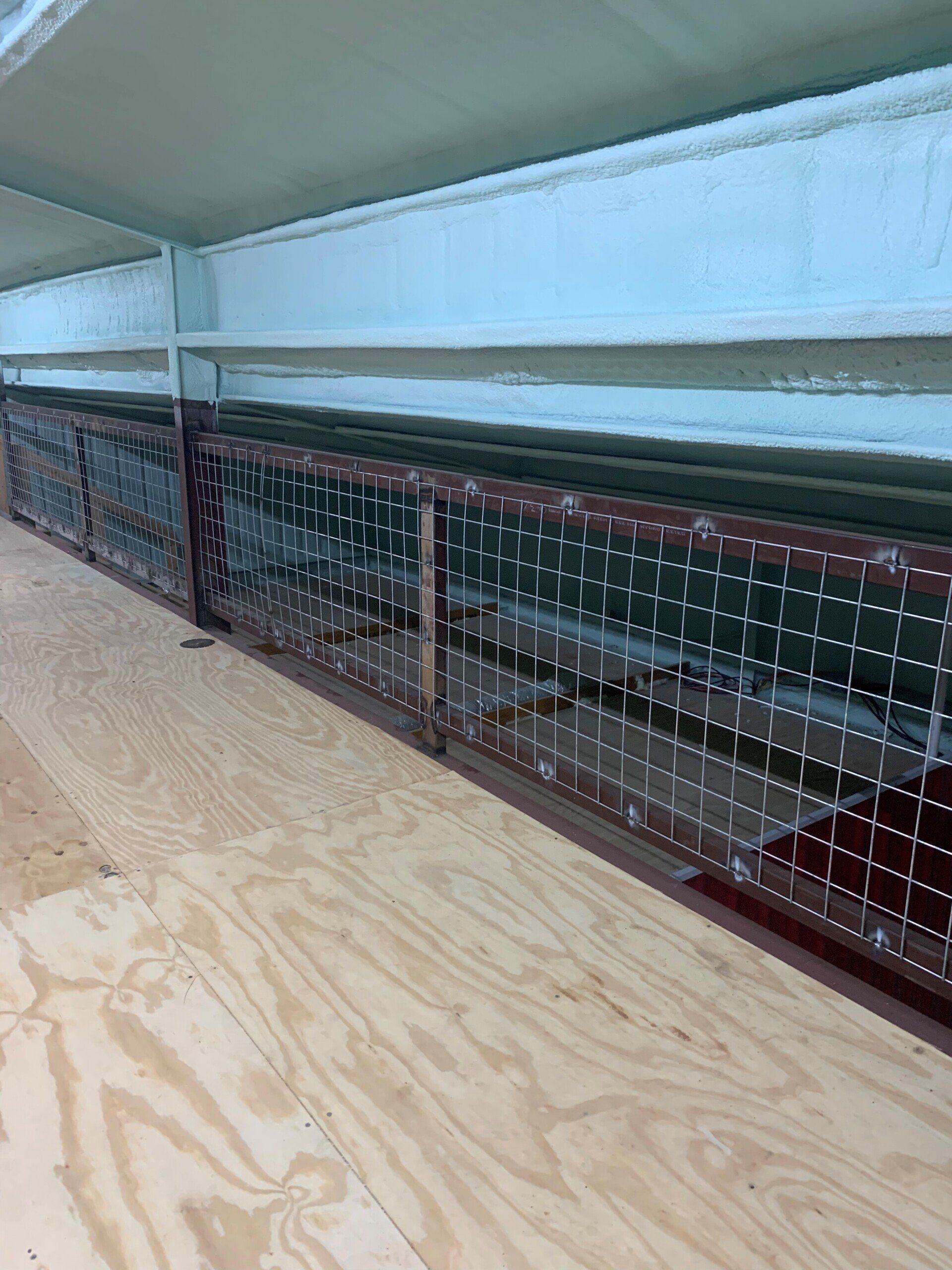 A row of shelves sitting on top of a wooden floor.