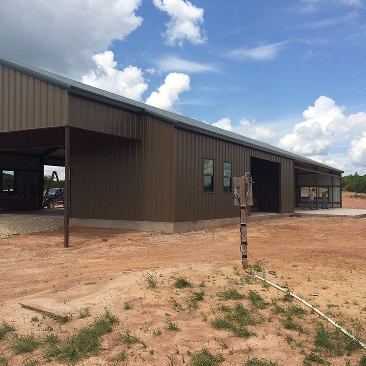 A brown building with a blue sky in the background