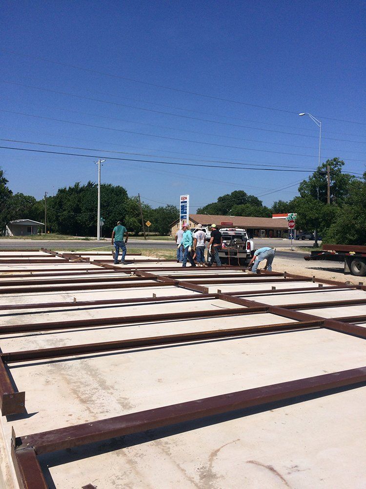 A group of people are working on a construction site.