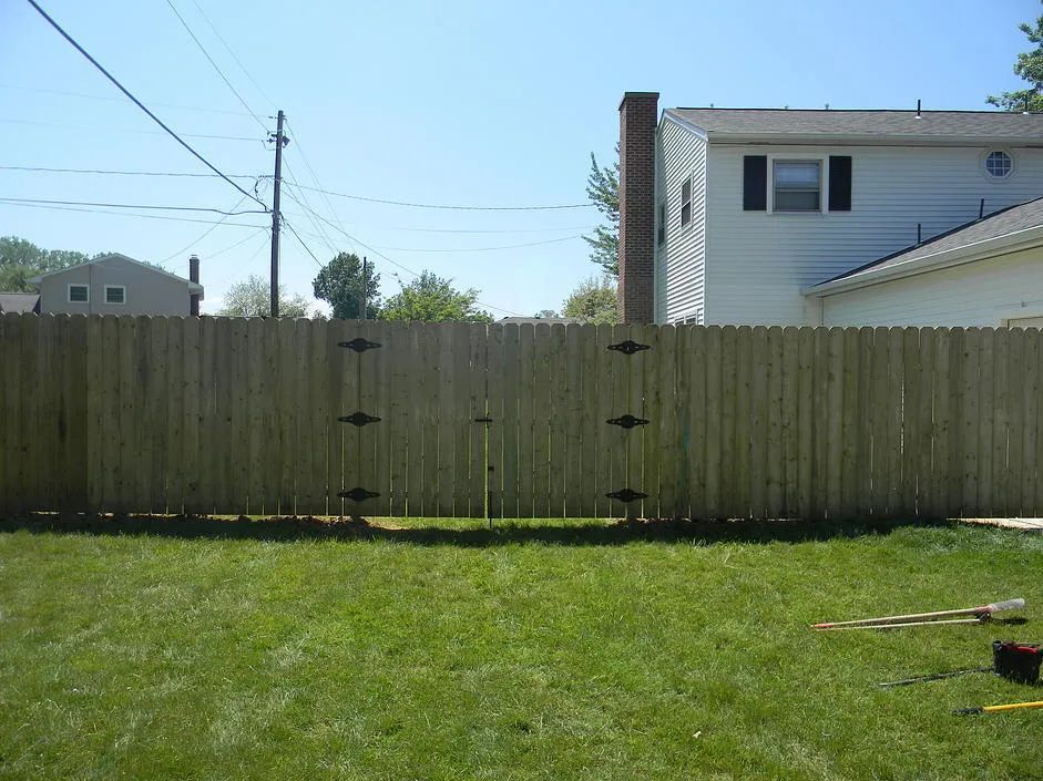 wooden fence with double gate