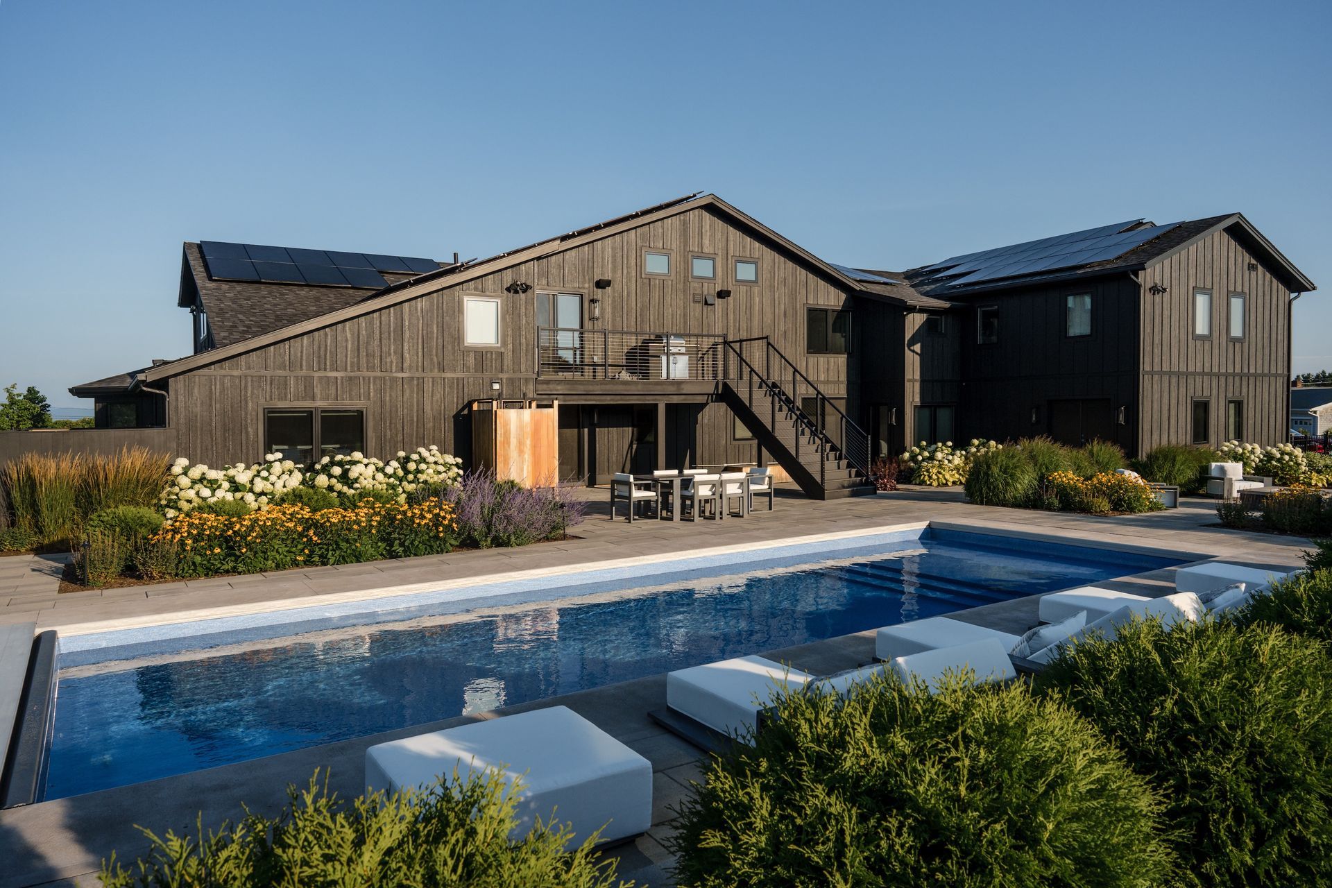A home with a pool and covered patio. 