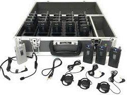 A briefcase filled with a bunch of walkie talkies and headsets.