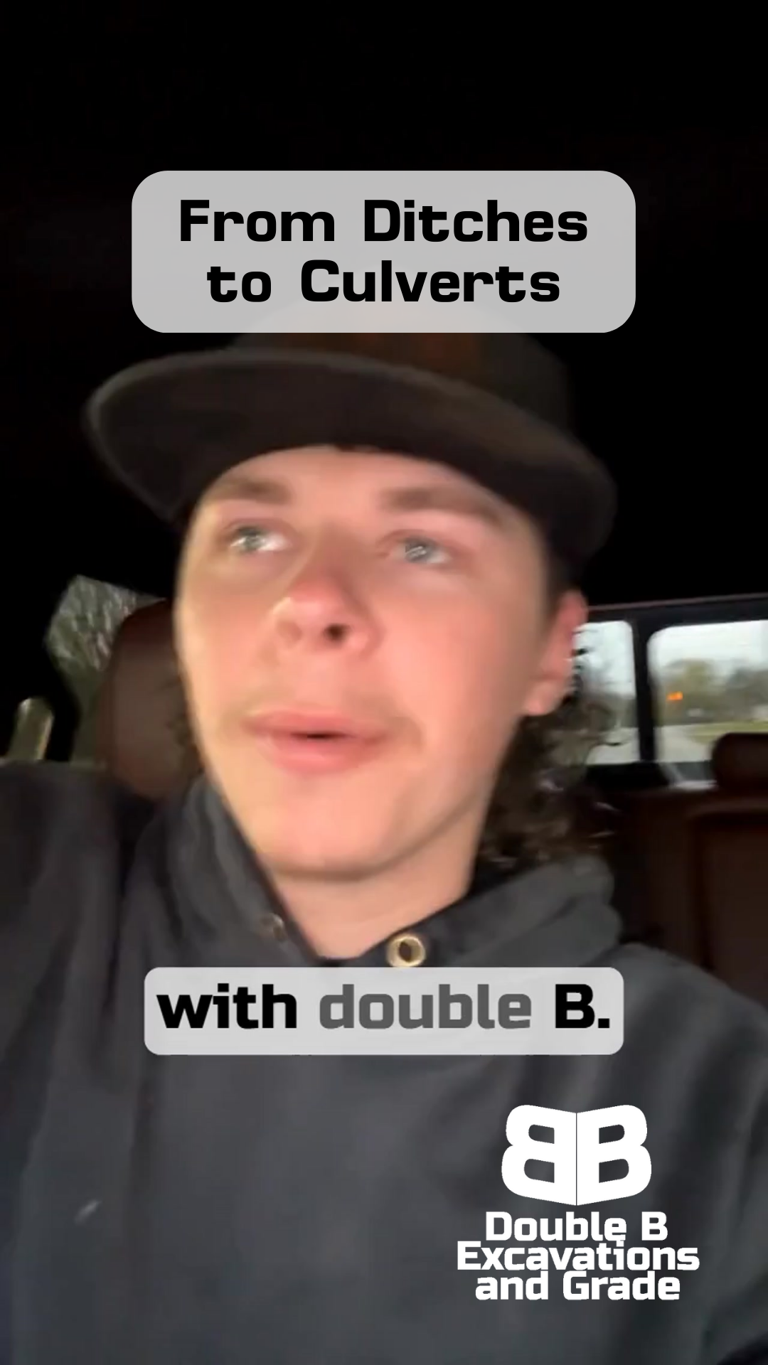 A man wearing a hat and a black hoodie with double b excavations and grace written on it