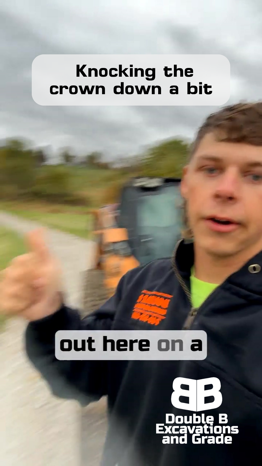 Man giving a thumbs up in front of construction equipment, text overlay