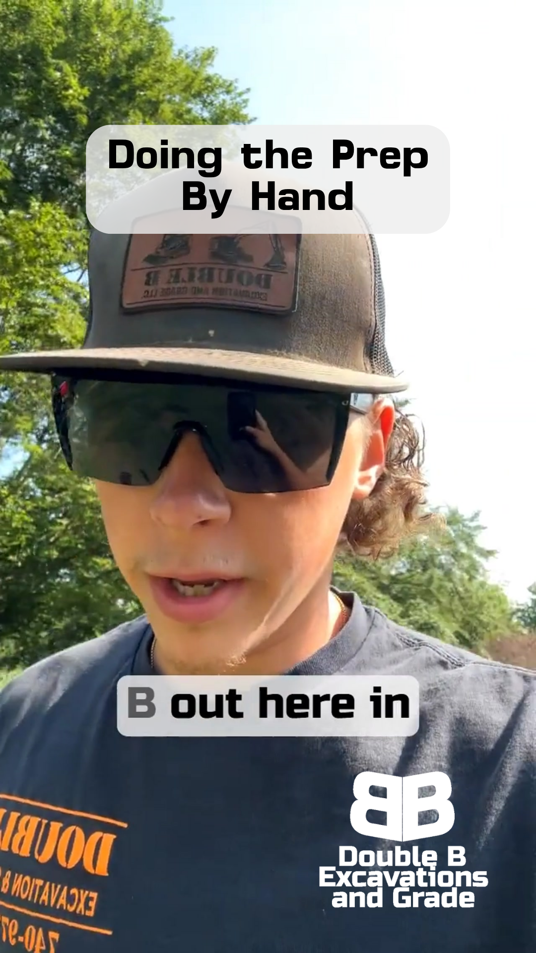 A man wearing a hat and sunglasses is doing the prep by hand.