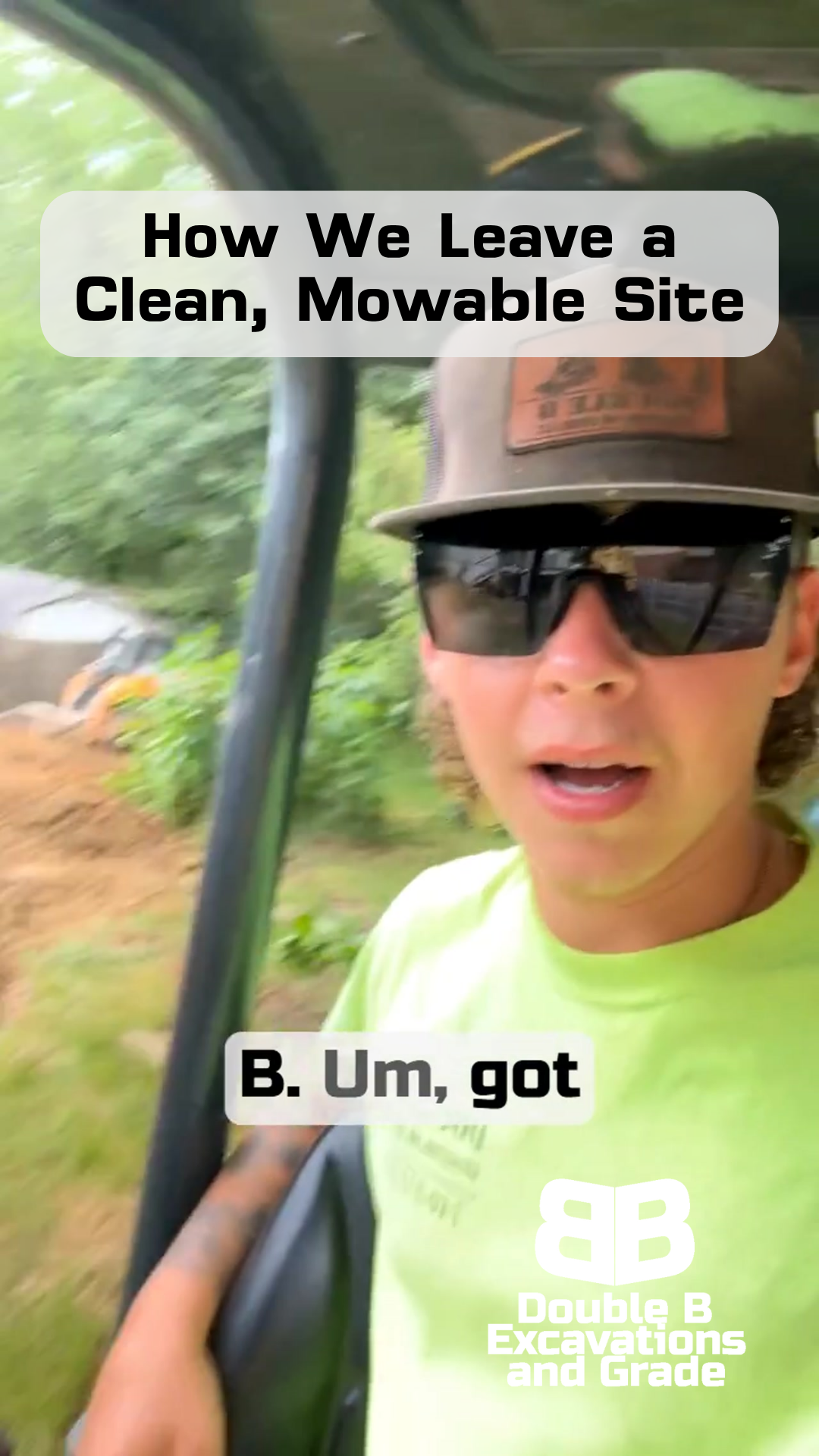 A man wearing sunglasses and a hat is driving a vehicle.