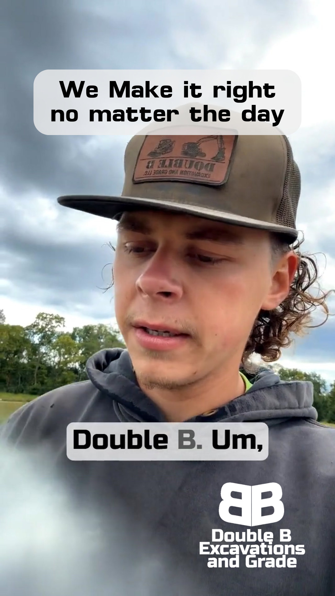 A man wearing a cap and hoodie speaks outdoors. Text overlays include