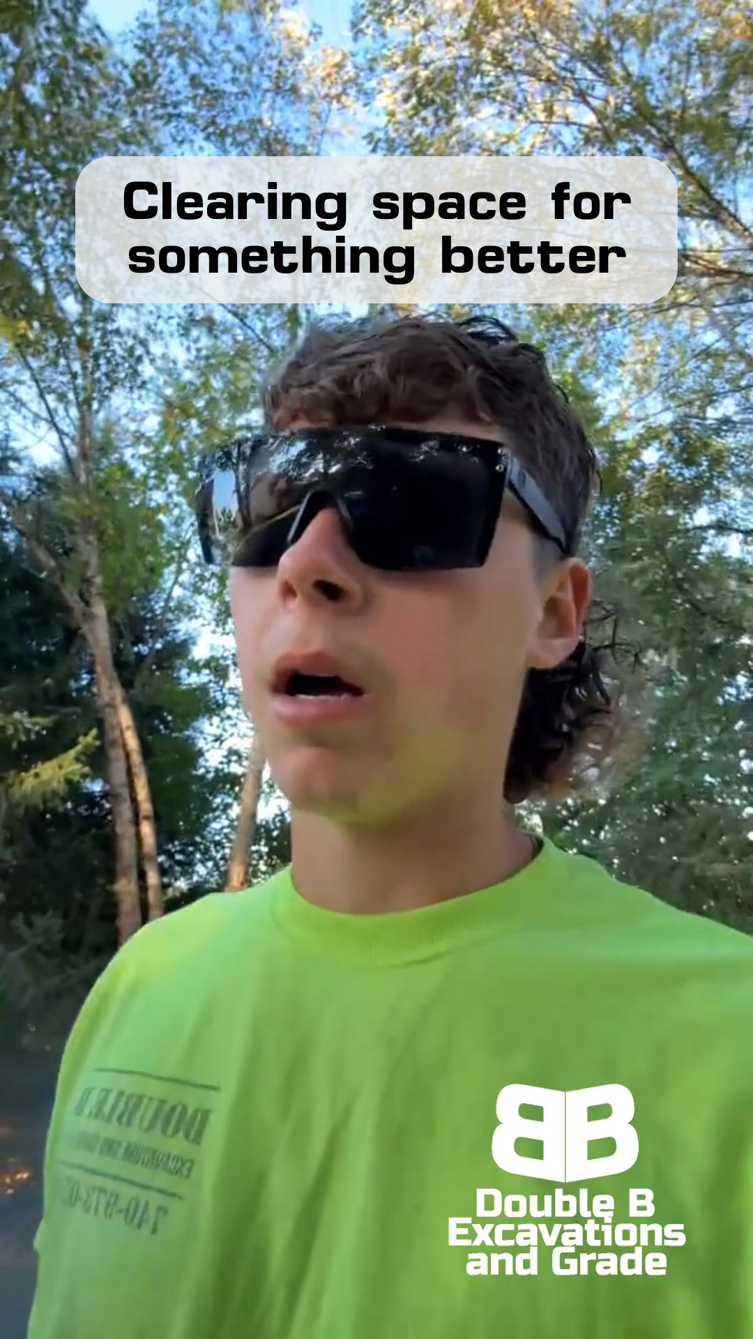 A young man wearing sunglasses and a neon green shirt, with text that says