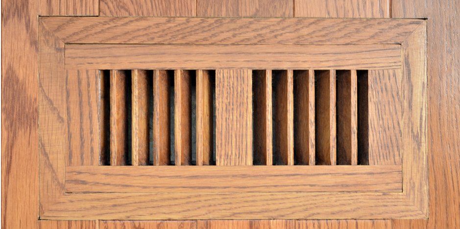 A fully-functioning indoor vent with wood texture