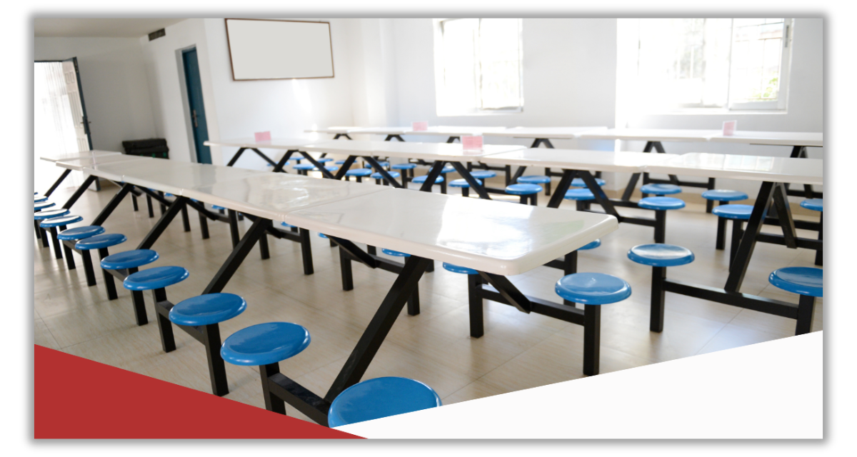 A long table with blue stools in a dining room.