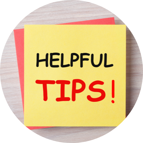 HELPFUL TIPS written on yellow note on a wooden desk