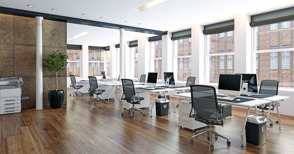 A modern office space with tables and chairs