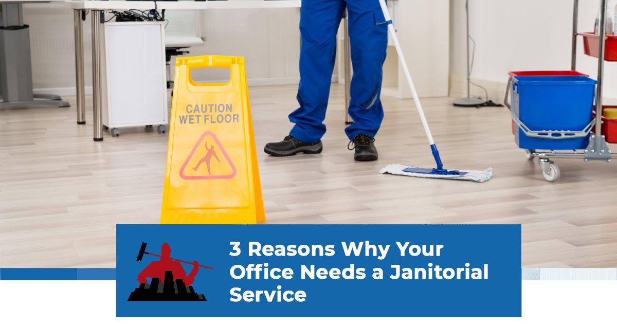 A janitor dry wet mopping the floor.