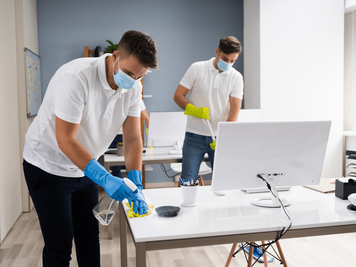 professional office cleaning services with face masks