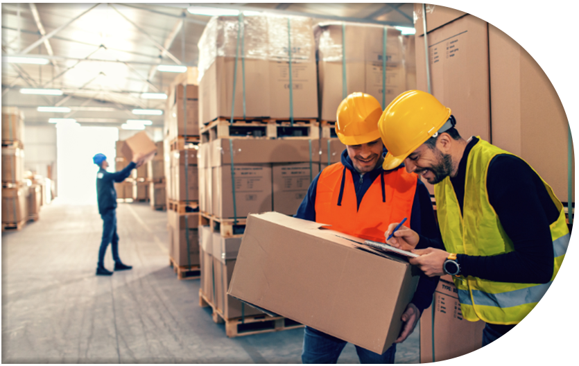 warehouse worker labeling and checking boxes