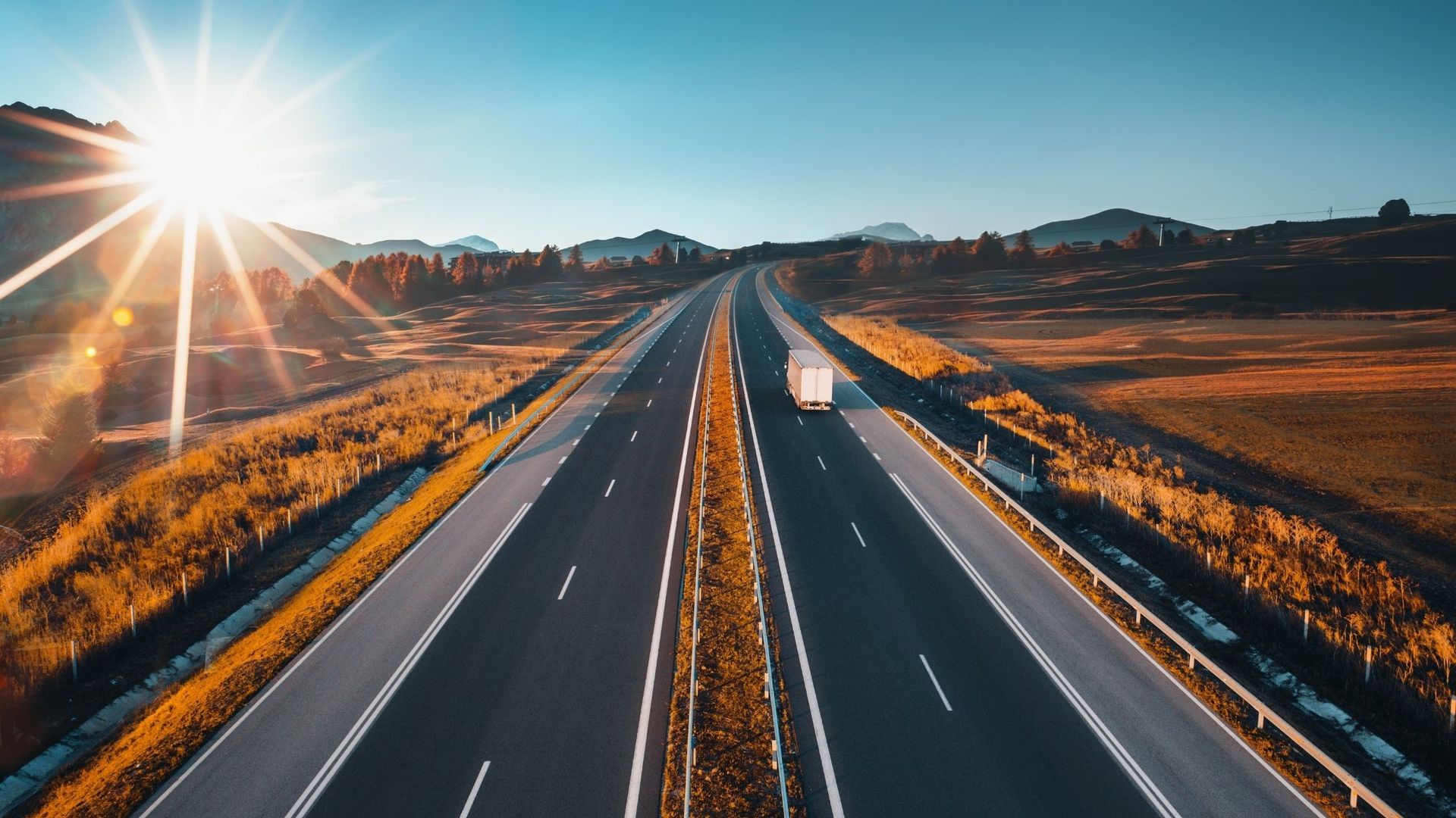 Truck making a delivery on an empty highway