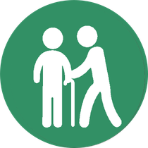 A person is helping an older person with a cane.