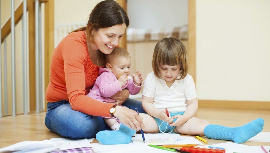 The dedicated nanny skillfully juggled playtime and snacks, keeping the two energetic kids happily 