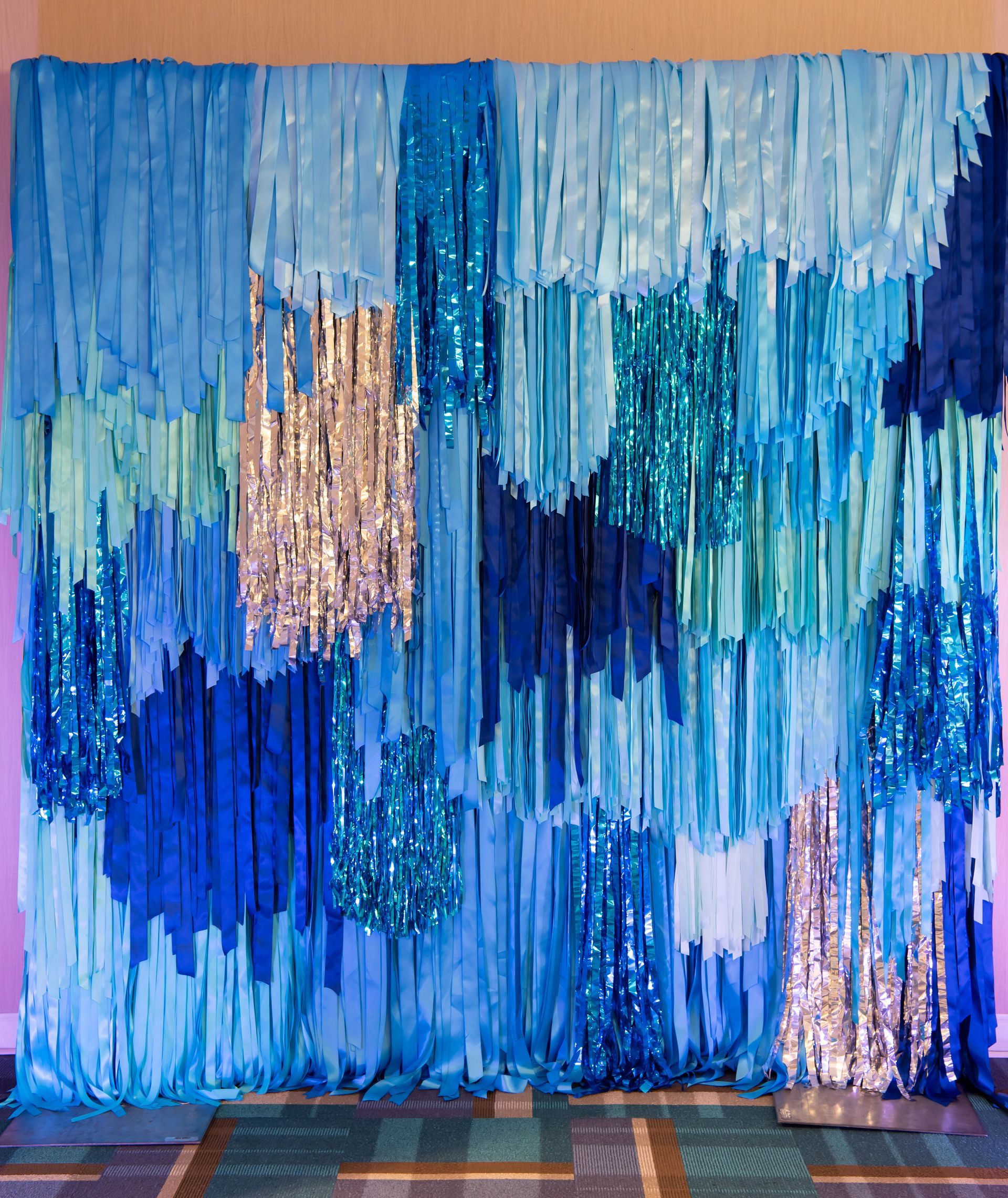 Blue and silver streamer backdrop.