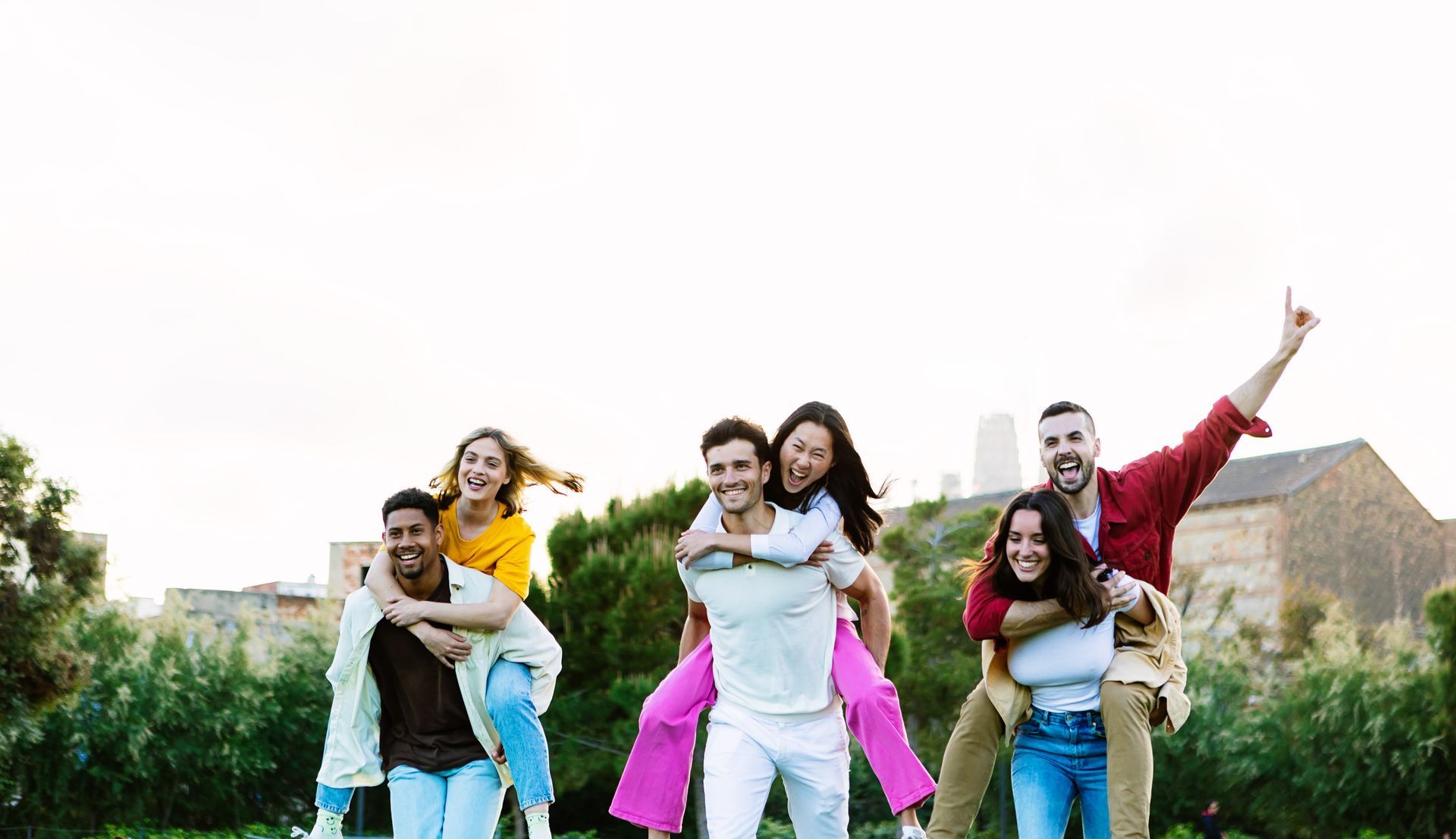 A woman is writing on a clipboard while a man wearing a mask looks on.