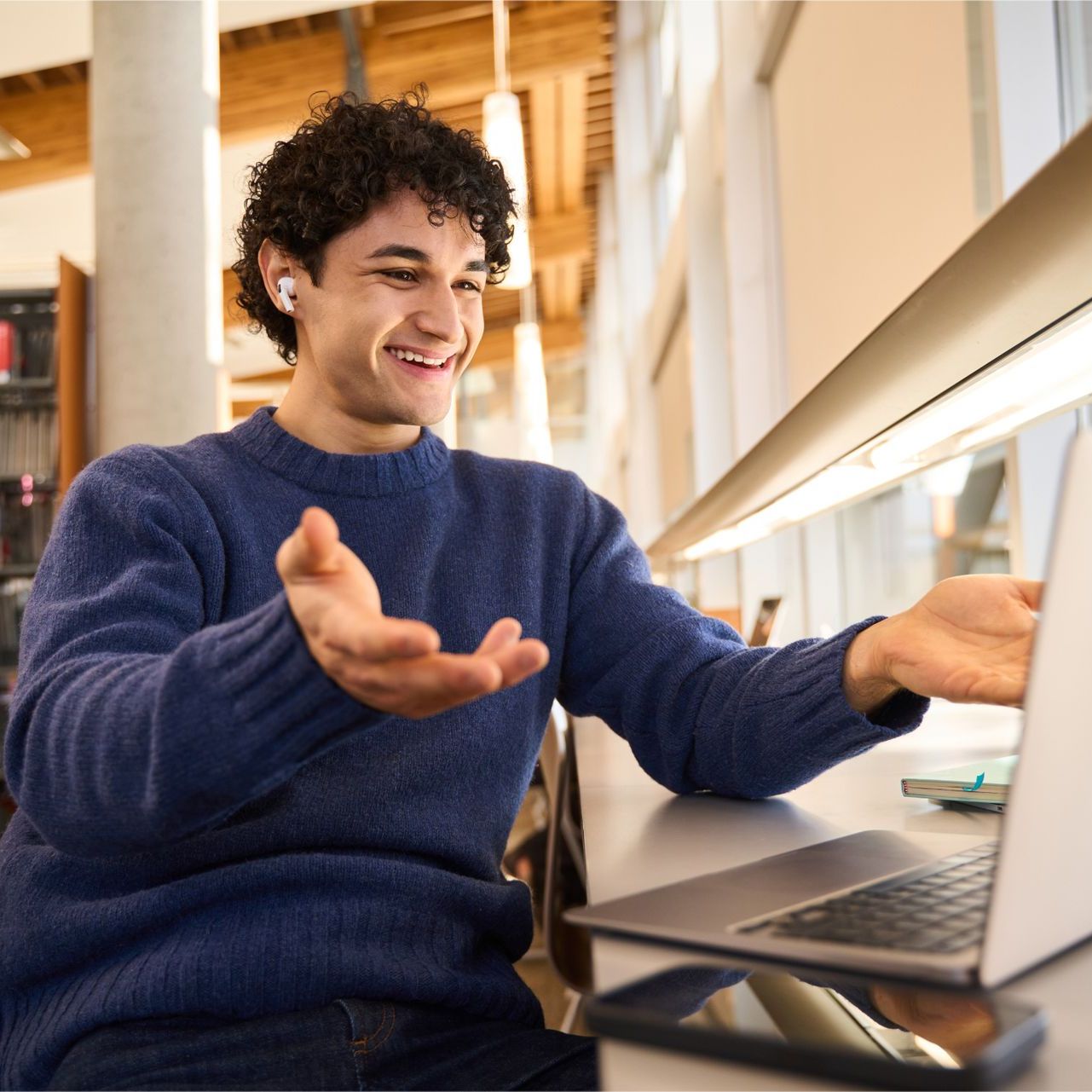 A woman is writing on a clipboard while a man wearing a mask looks on.