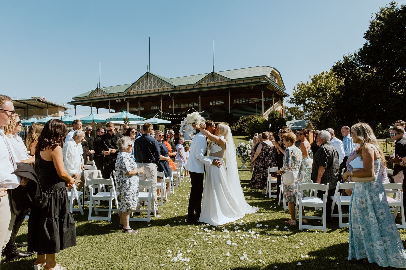 newlywed couple and their guest