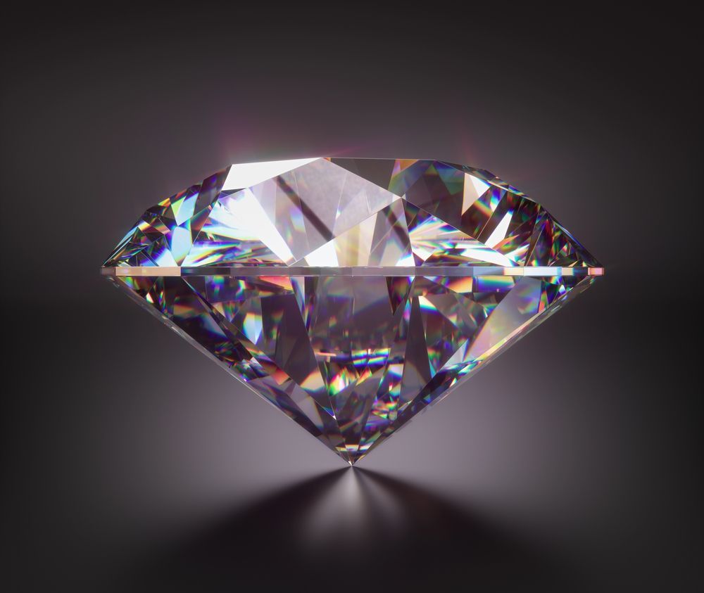 Diamante scintillante su uno sfondo grigio scuro, che mette in risalto le sue sfaccettature e riflette la luce.