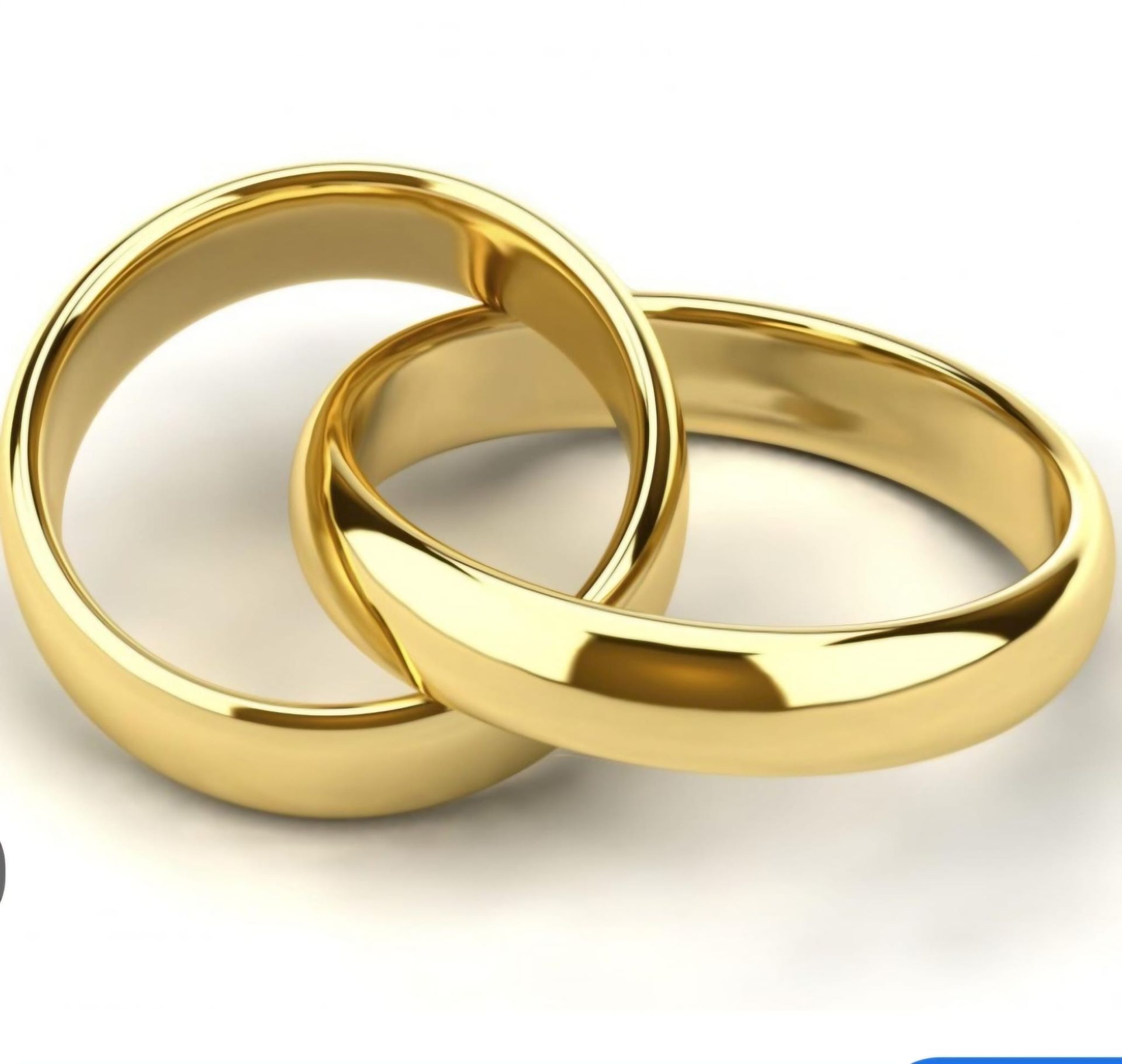 Due fedi nuziali d'oro intrecciate.