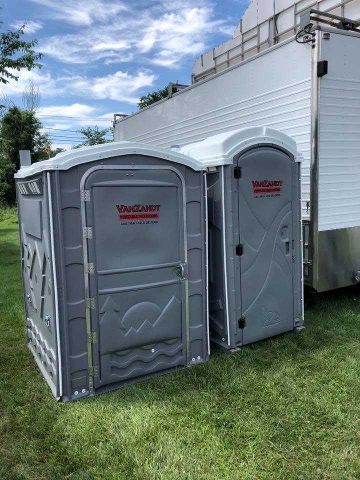 Toilet Services — Portable Toilet In A Grass in Lee, MA