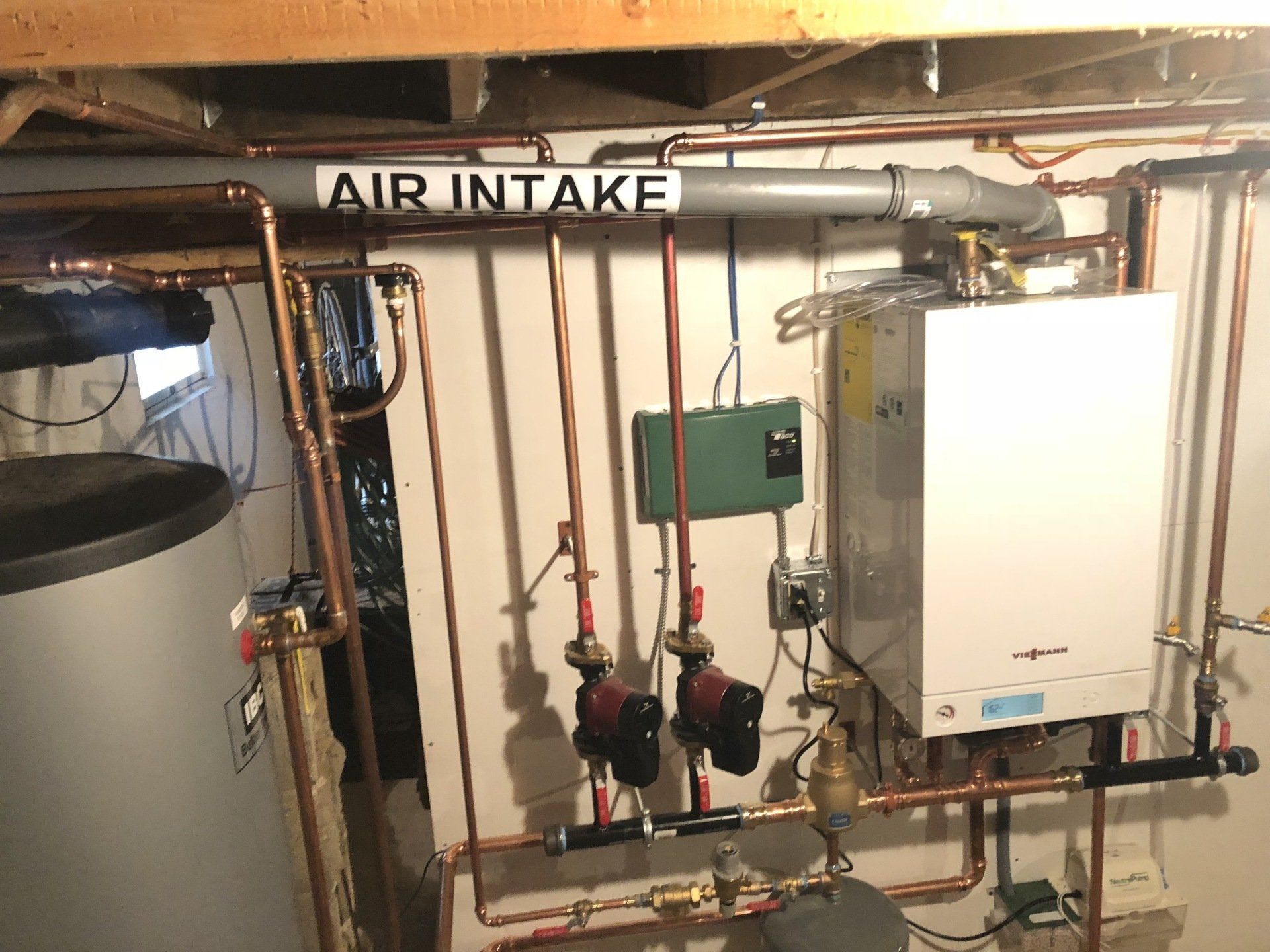 Heating Services — Man Holding A Heater Meter in Lee, MA