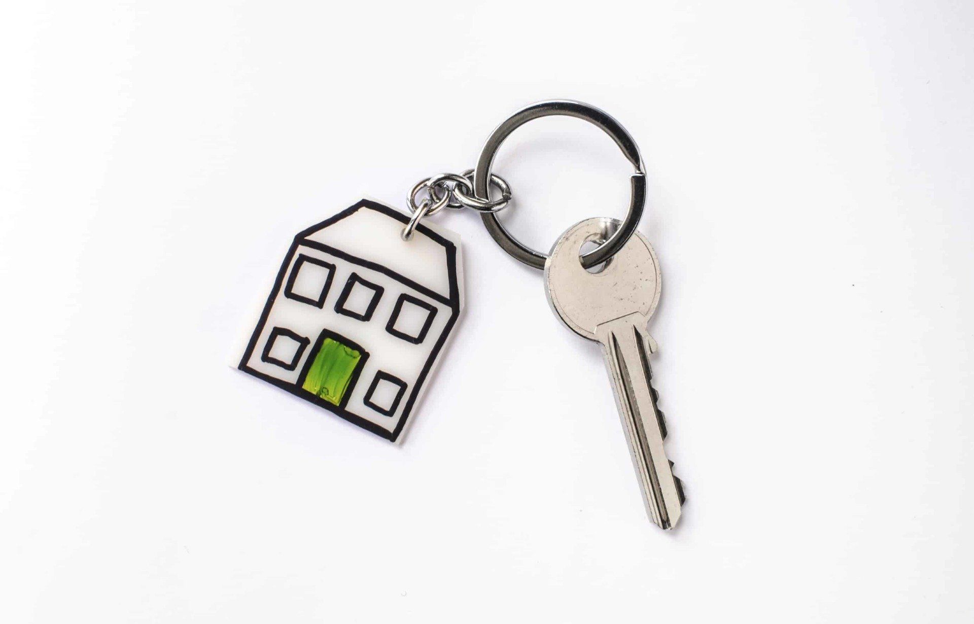 Key on a cartoon house keychain