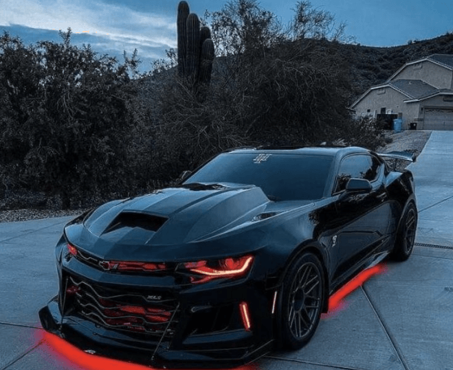 BMW With Blue Underglow On Rollers