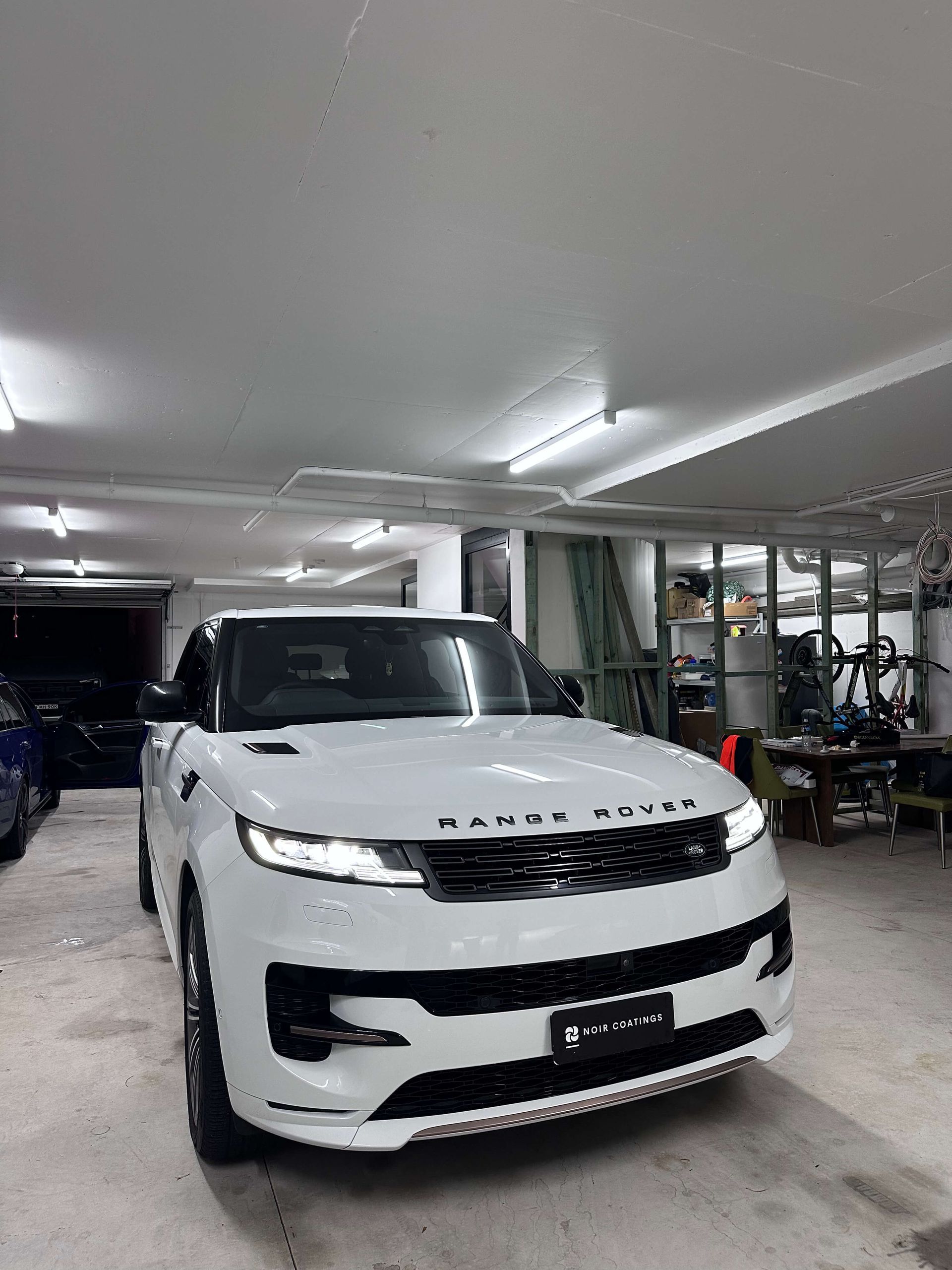 Washing Blue Suv Panel With Microfiber Mitt And Foam