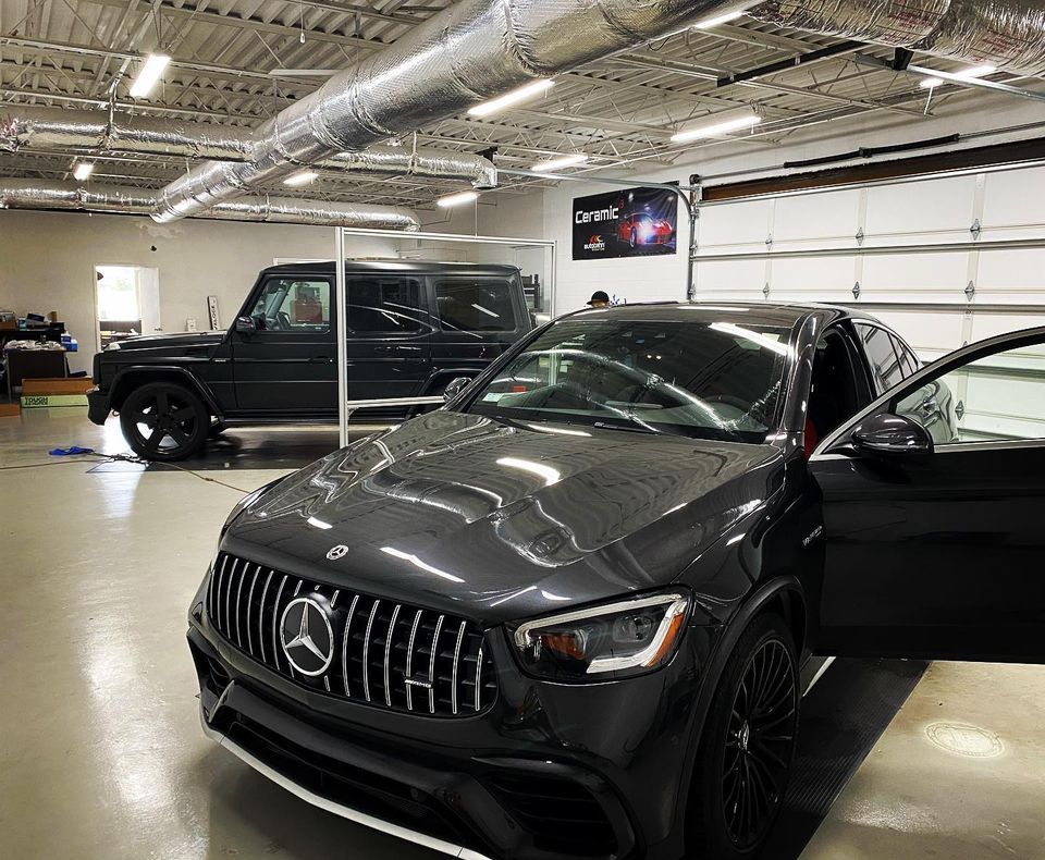 A Black Car With Tinted Windows — Greenville, SC — iTint