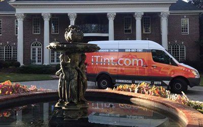 iTint Service Truck Parked in Front of a Residential Property — Greenville, SC — iTint