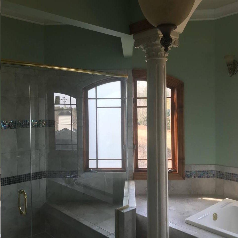 A Bathroom With Tinted Window Tint Installed — Greenville, SC — iTint