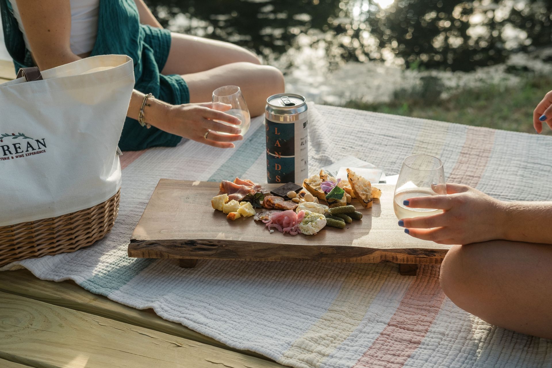 A close up of a plate of food with meat and vegetables on a table.