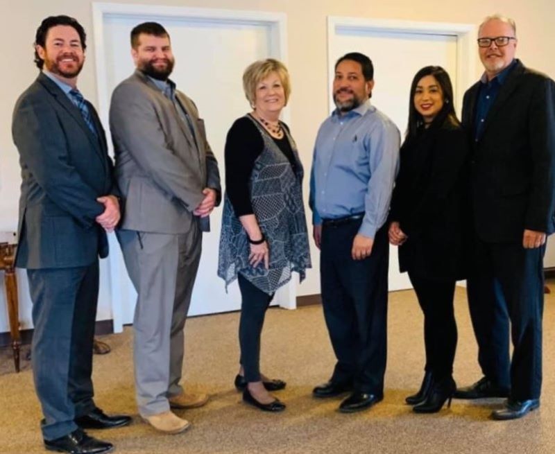 A church with a cross on the front of it